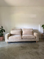 muji 2.5 seater feather pocket coil sofa with removable headrest